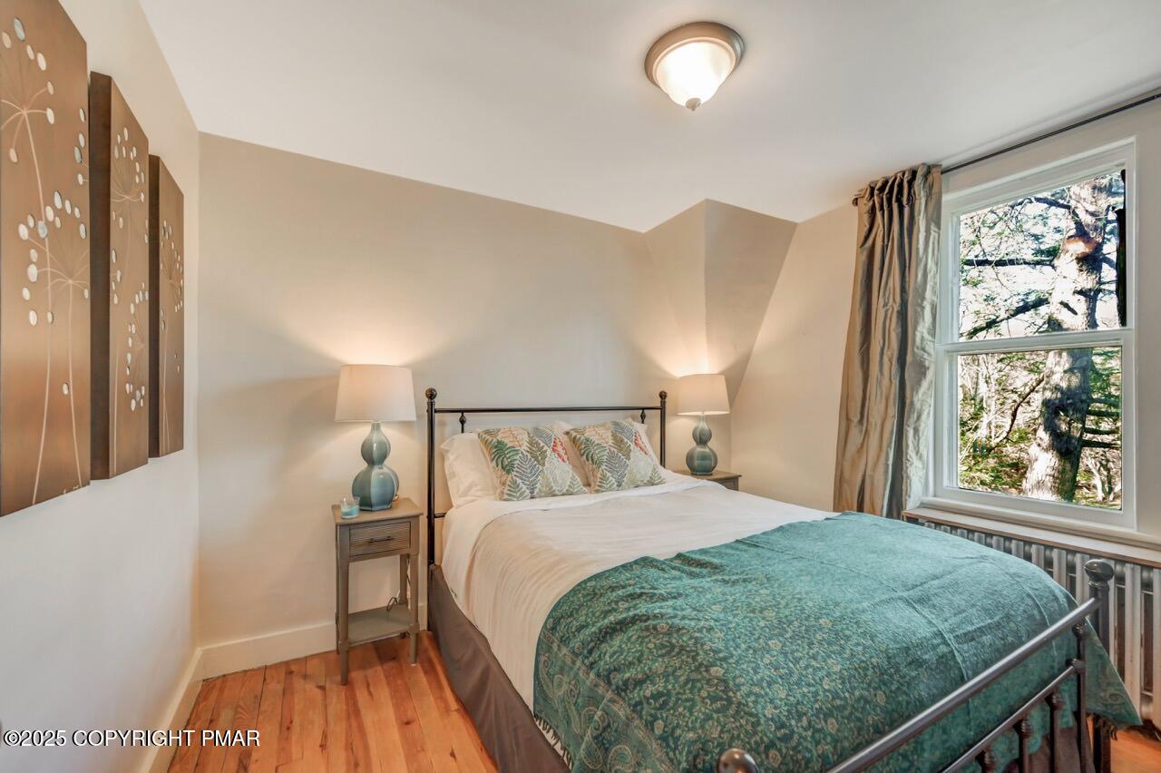 3 Stone Tree Drive Canadensis, PA 18325 - Photo 108 of 201 a bedroom with a bed and a large window with outer view