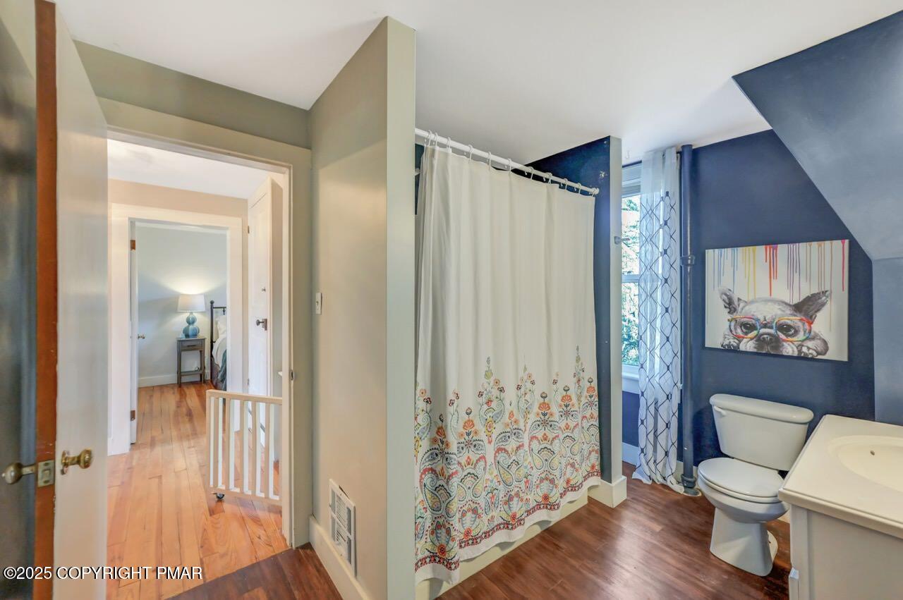 3 Stone Tree Drive Canadensis, PA 18325 - Photo 116 of 201 a bathroom with a toilet a sink and a large mirror