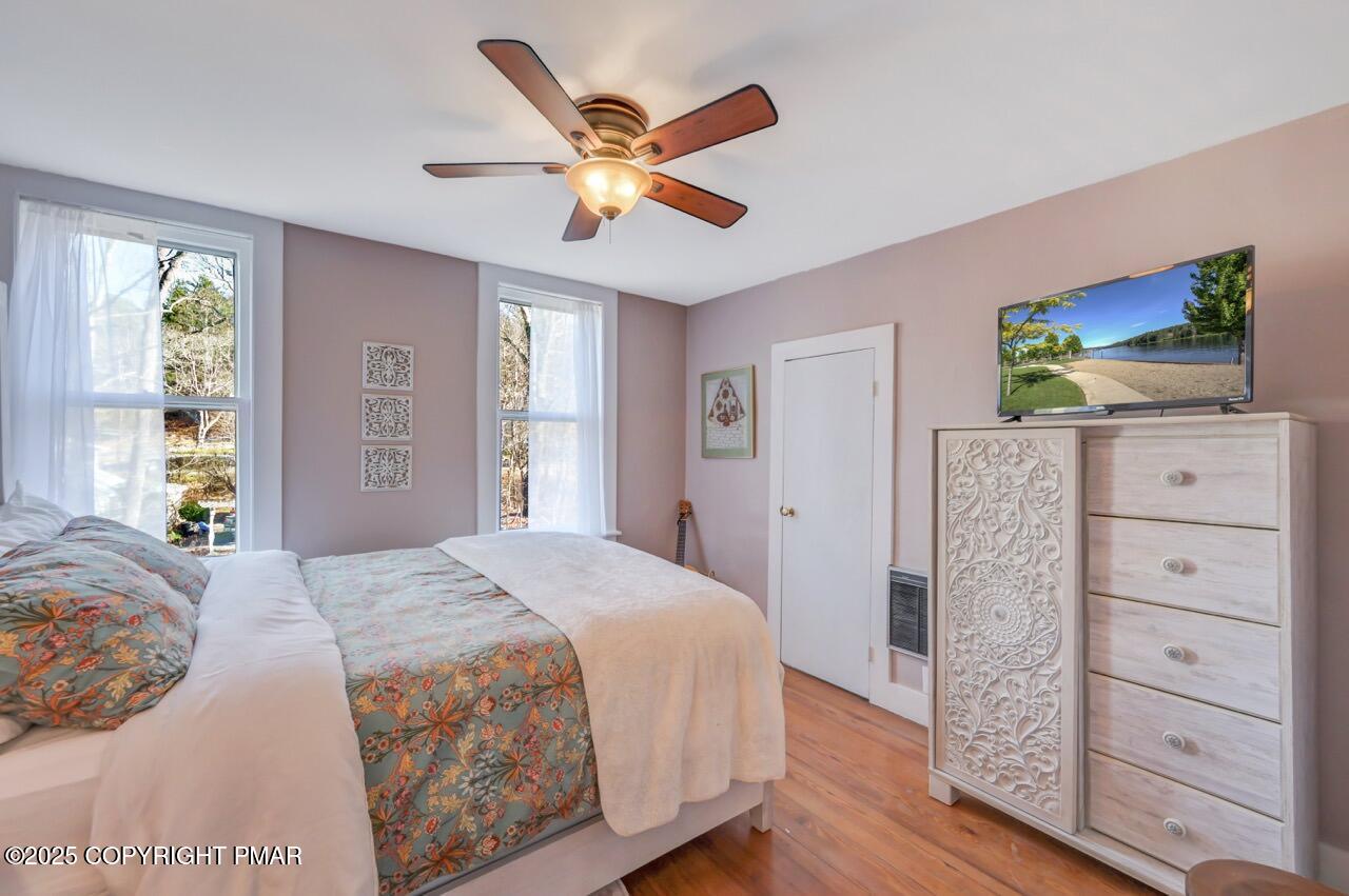 3 Stone Tree Drive Canadensis, PA 18325 - Photo 122 of 201 a bedroom with a bed and a flat screen tv