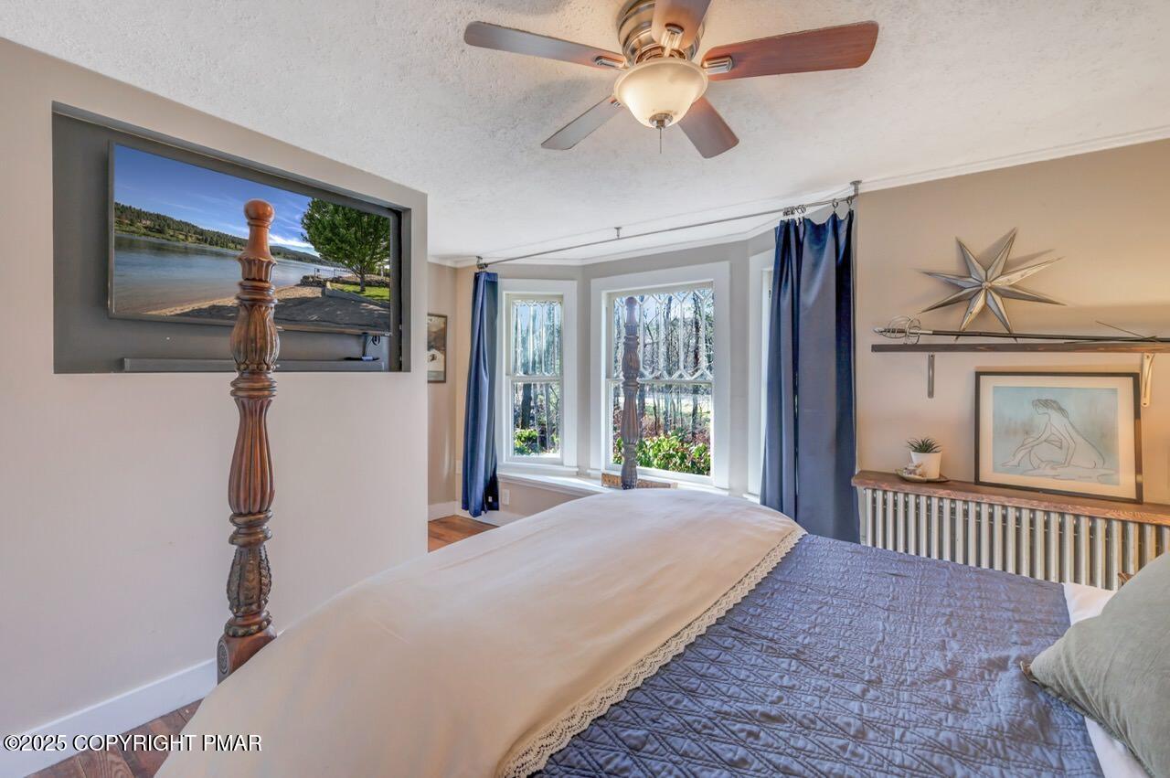 3 Stone Tree Drive Canadensis, PA 18325 - Photo 127 of 201 a bedroom with a bed and a flat screen tv