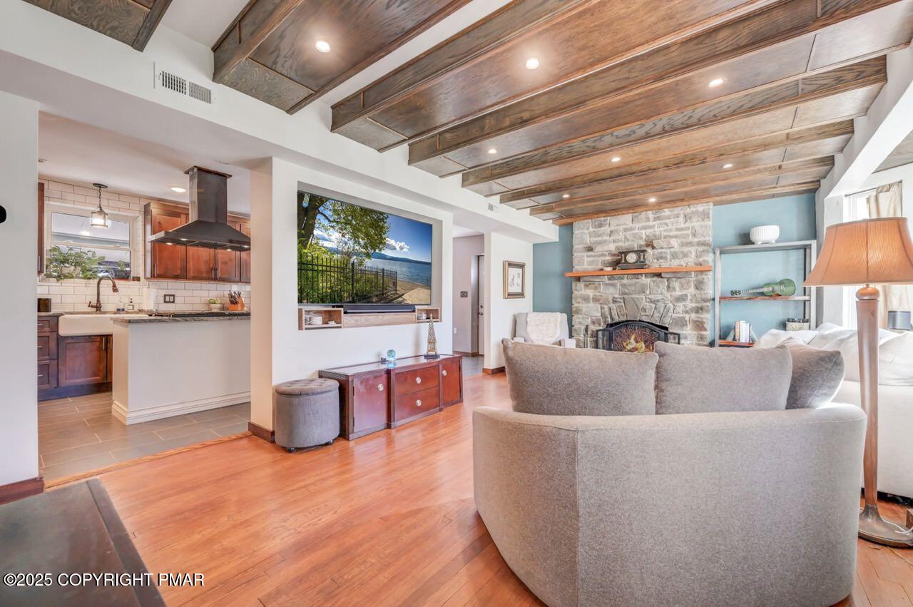3 Stone Tree Drive Canadensis, PA 18325 - Photo 142 of 201 a living room with furniture and a flat screen tv