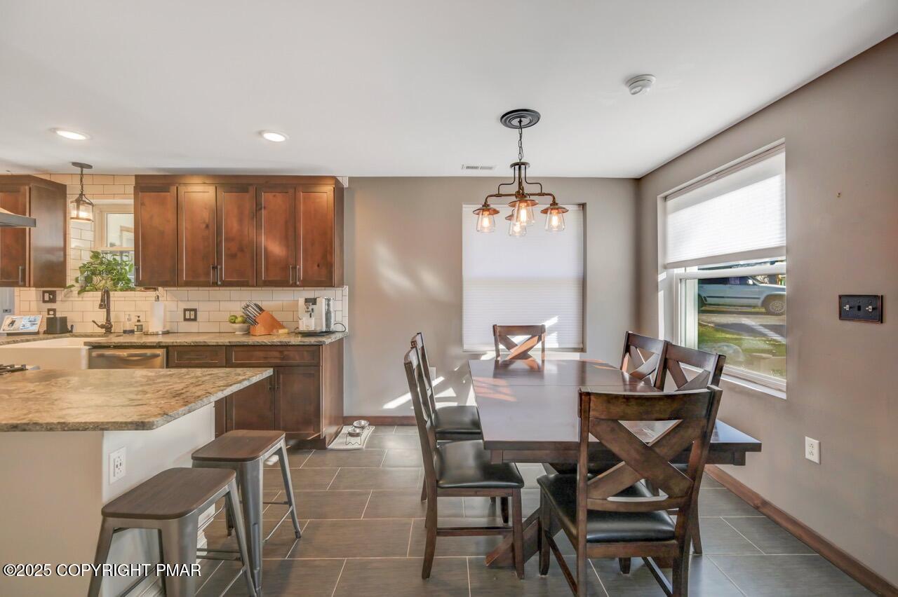 3 Stone Tree Drive Canadensis, PA 18325 - Photo 153 of 201 a view of a dining room with furniture window and outside view