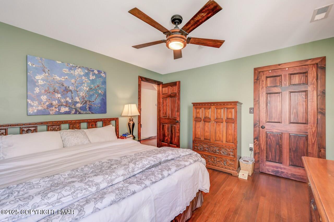 3 Stone Tree Drive Canadensis, PA 18325 - Photo 159 of 201 a bedroom with a large bed and a large window