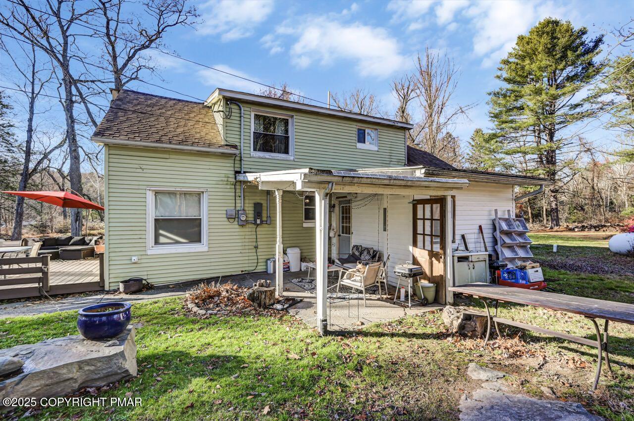 3 Stone Tree Drive Canadensis, PA 18325 - Photo 188 of 201 a view of a house with backyard tub and sitting area