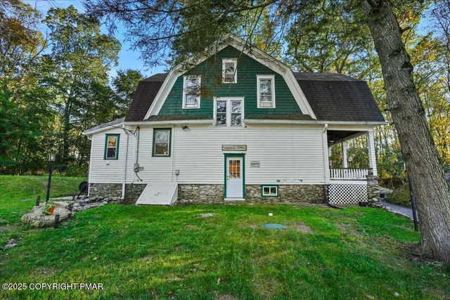 a kitchen with stainless steel appliances granite countertop a stove and a refrigerator