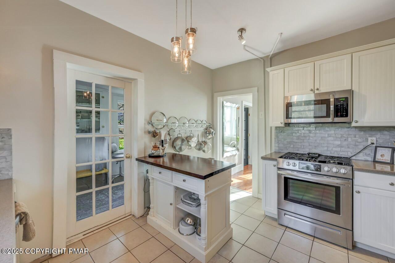 3 Stone Tree Drive Canadensis, PA 18325 - Photo 93 of 201 a kitchen with stainless steel appliances granite countertop a stove and a refrigerator