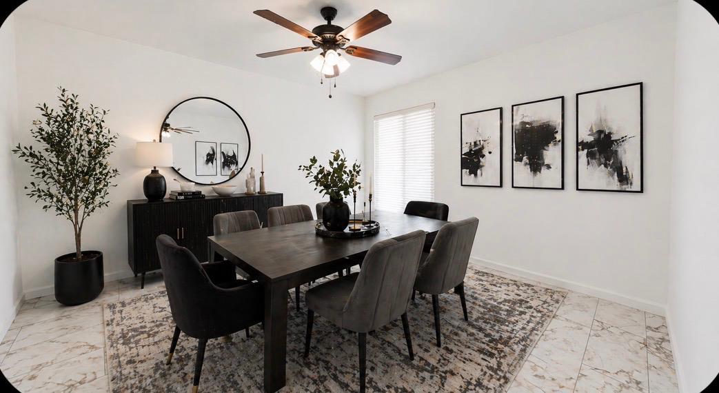 3279 Cherokee Avenue Merced, CA 95340 - Photo 11 of 30 a view of a dining room with furniture and chandelier
