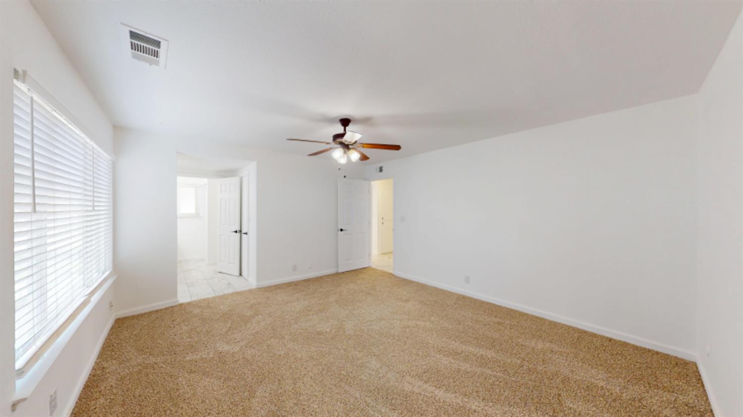 3279 Cherokee Avenue Merced, CA 95340 - Photo 12 of 30 a view of a big room with carpet