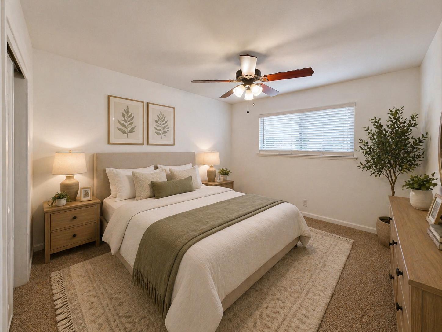 3279 Cherokee Avenue Merced, CA 95340 - Photo 18 of 30 a bedroom with a bed and a chandelier