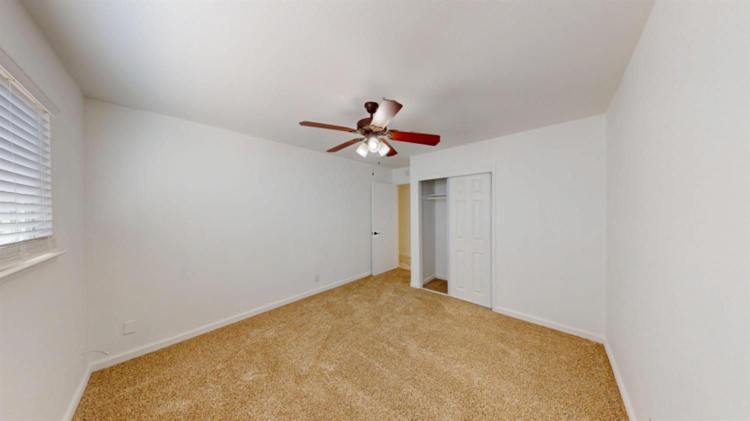 3279 Cherokee Avenue Merced, CA 95340 - Photo 22 of 30 a view of room with a ceiling fan