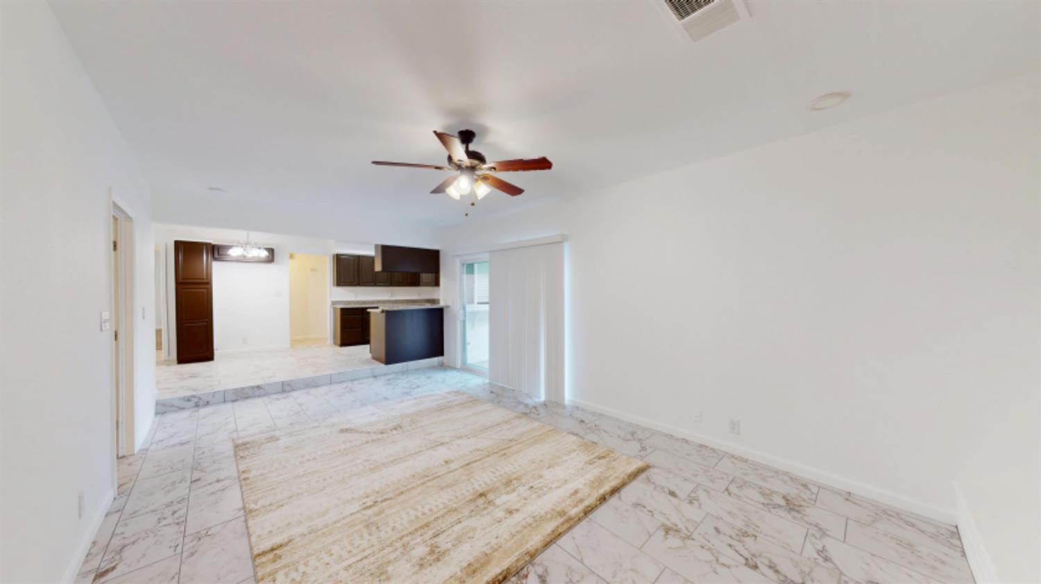 3279 Cherokee Avenue Merced, CA 95340 - Photo 24 of 30 a view of a livingroom with a kitchen