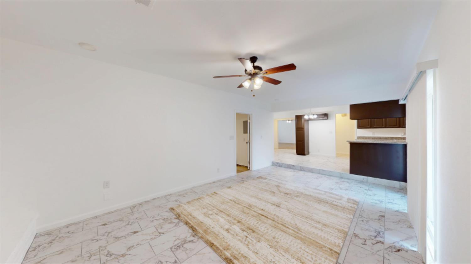 3279 Cherokee Avenue Merced, CA 95340 - Photo 25 of 30 a view of a livingroom with a flat screen tv