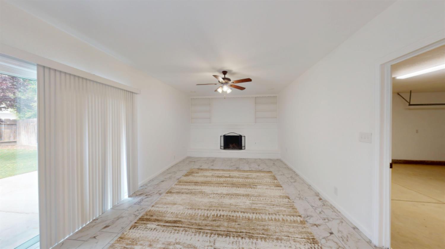 3279 Cherokee Avenue Merced, CA 95340 - Photo 5 of 30 a view of an empty room with a window