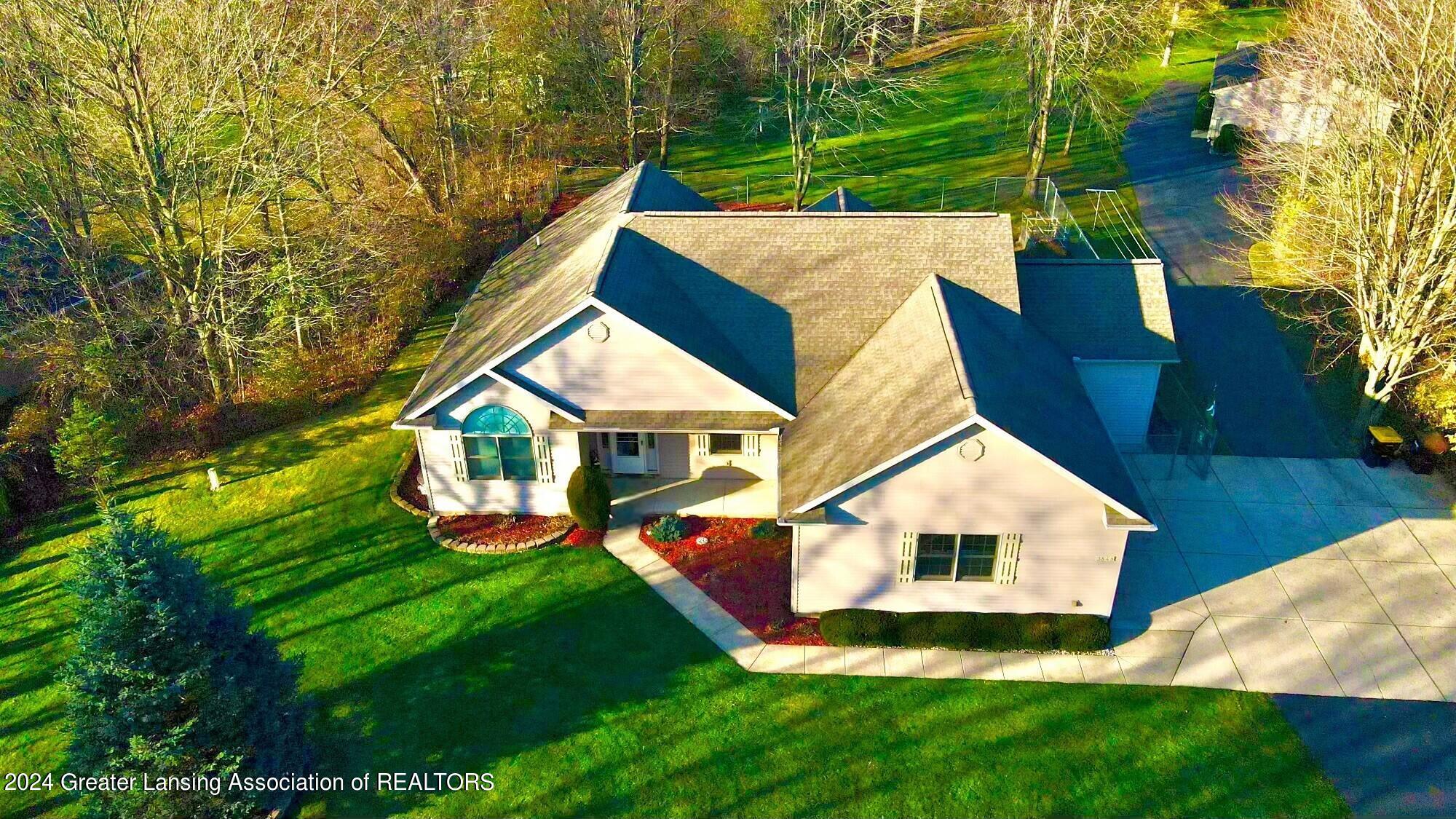 3848 Sandhill Road Lansing, MI 48911 - Photo 1 of 33 Aerial View of House and Pole Barn