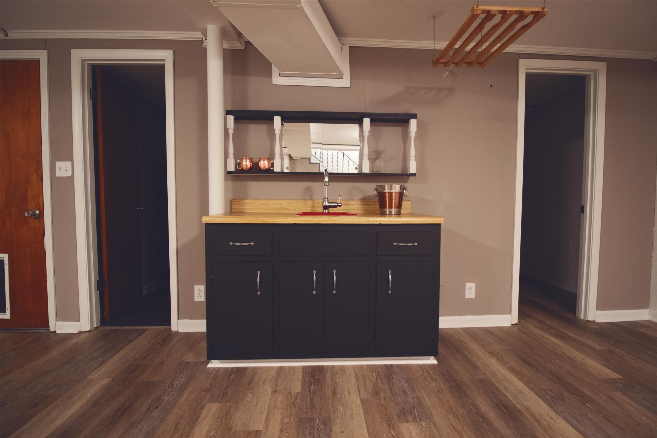 124 Union Hall Road Clarksville, TN 37040 - Photo 14 of 16 Finished Basement with New Paint, Flooring & Wet Bar