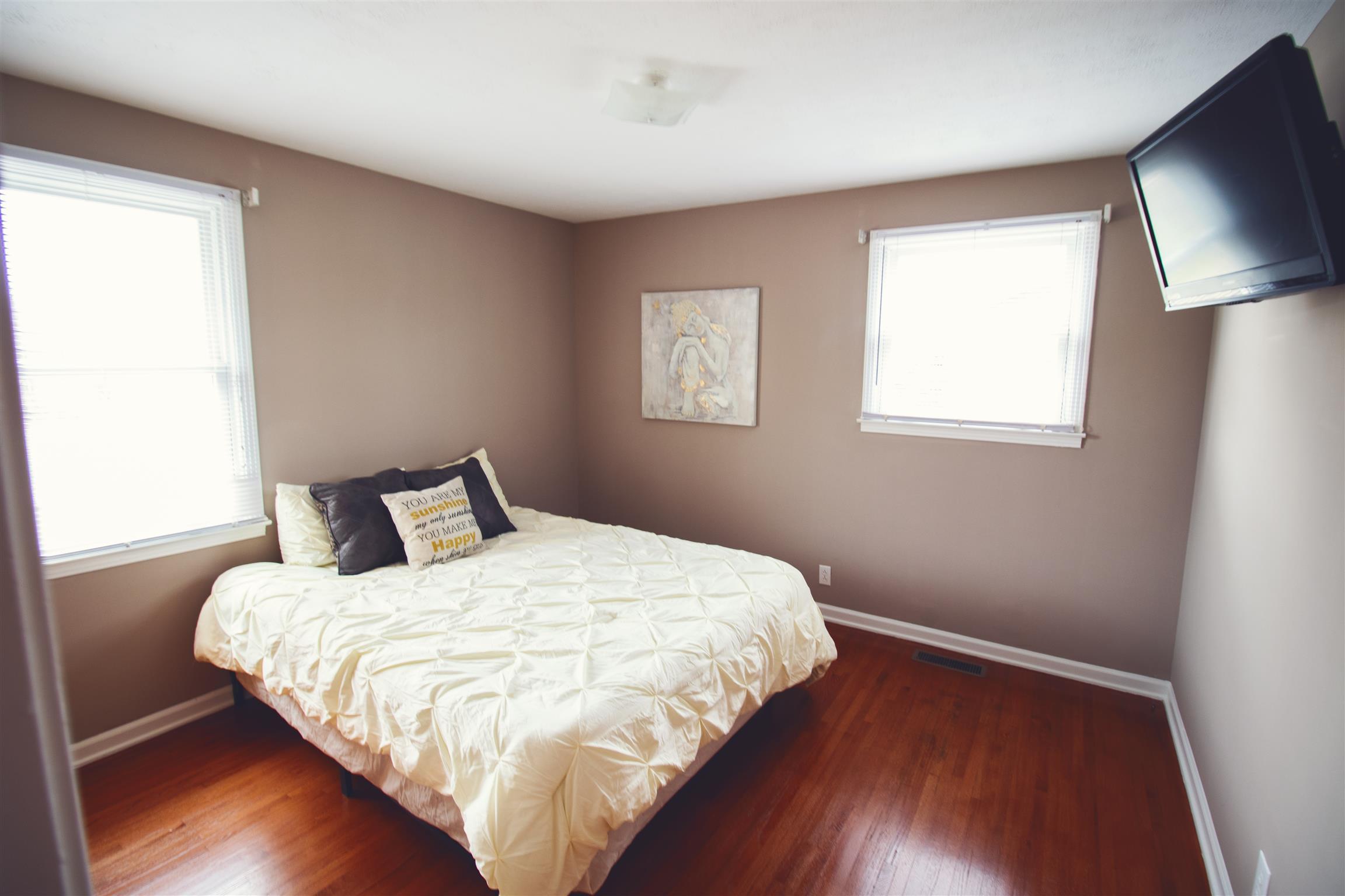 124 Union Hall Road Clarksville, TN 37040 - Photo 6 of 16 Bedroom 1 with Fresh Paint and Refinished Hardwood Floors