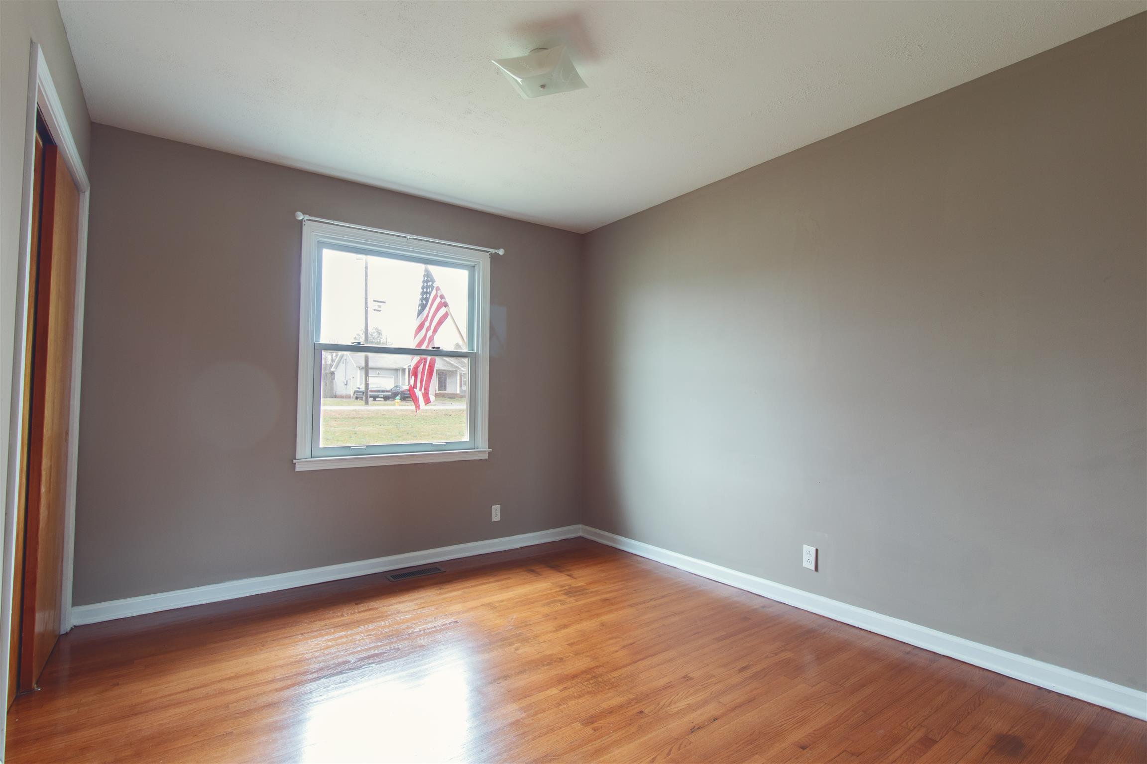 124 Union Hall Road Clarksville, TN 37040 - Photo 9 of 16 Bedroom 3 with Fresh Paint & Refinished Hardwood Floors