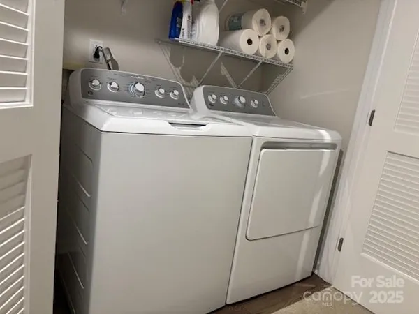 a utility room with dryer and washer
