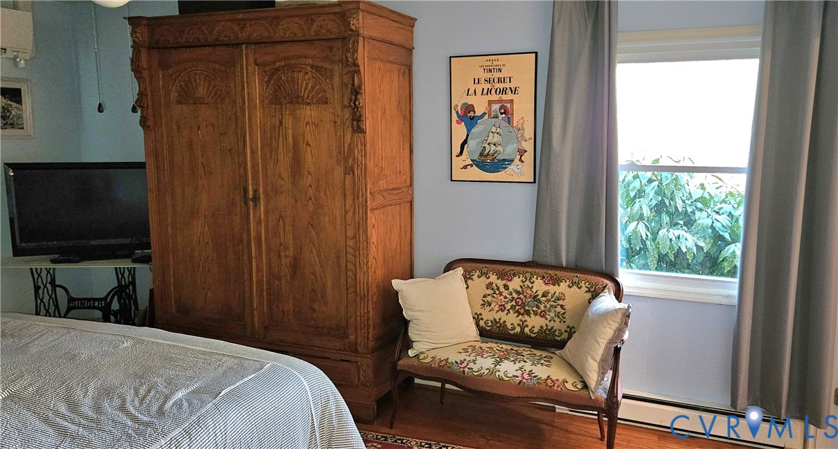459 Willow Lane Topping, VA 23169 - Photo 27 of 47 a bedroom with a couch and a window