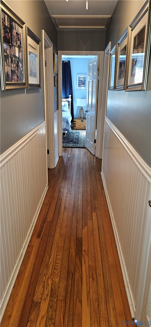 459 Willow Lane Topping, VA 23169 - Photo 32 of 47 a view of a hallway view with wooden floor and staircase