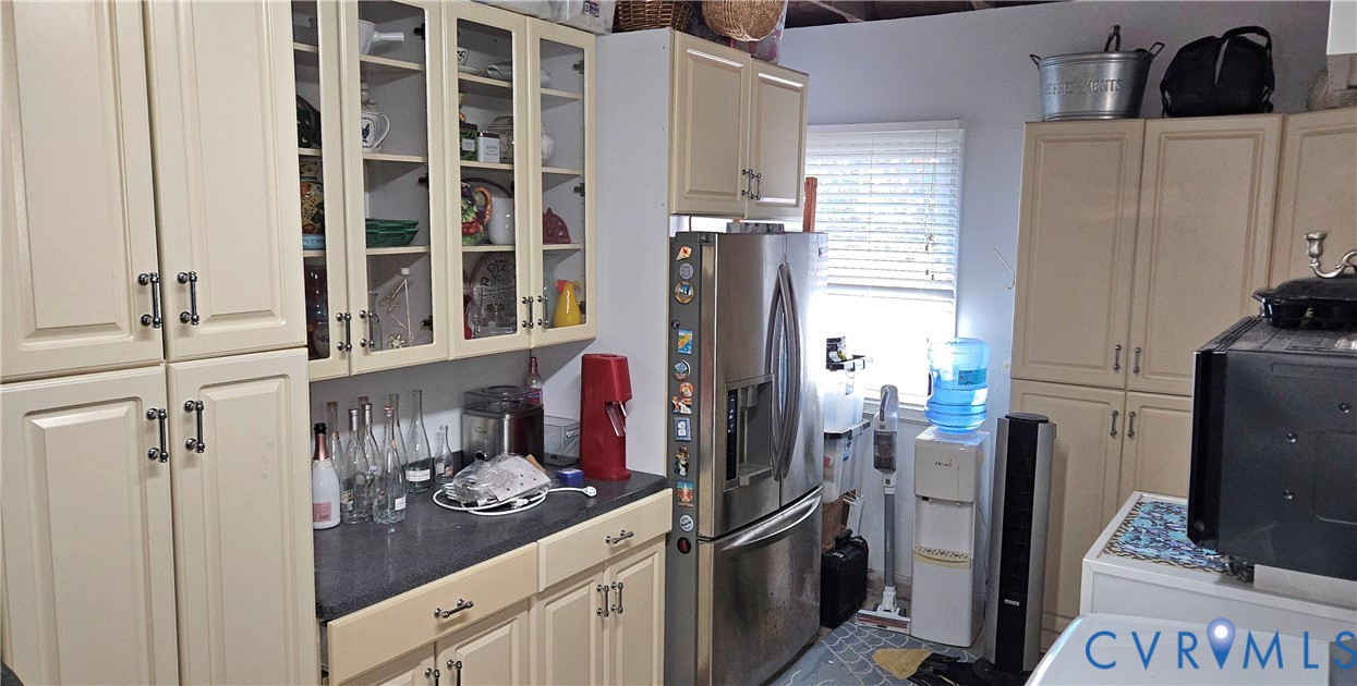 459 Willow Lane Topping, VA 23169 - Photo 39 of 47 a view of a kitchen with refrigerator and washing machine