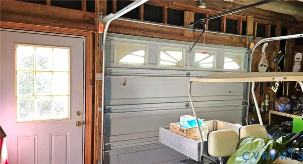 a view of a two chairs in a patio