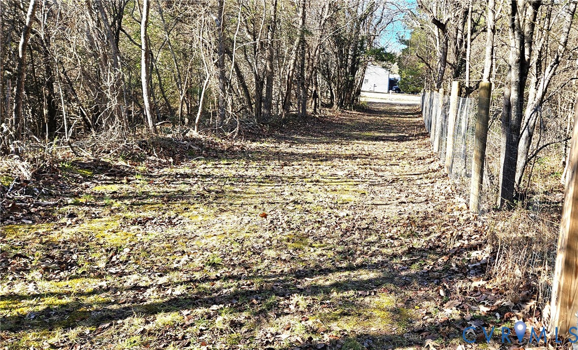 459 Willow Lane Topping, VA 23169 - Photo 47 of 47 a view of of tiny house with a trees