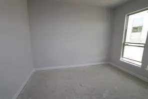 a view of empty room with window