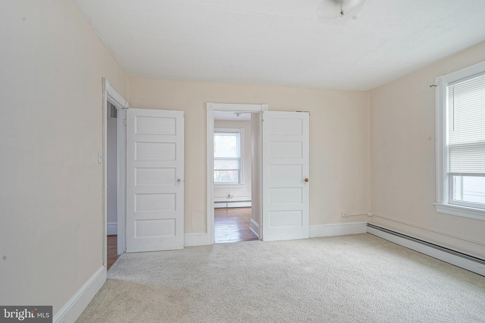 107 Colonial Avenue Haddonfield, NJ 08033 - Photo 21 of 29 an empty room with windows and closet