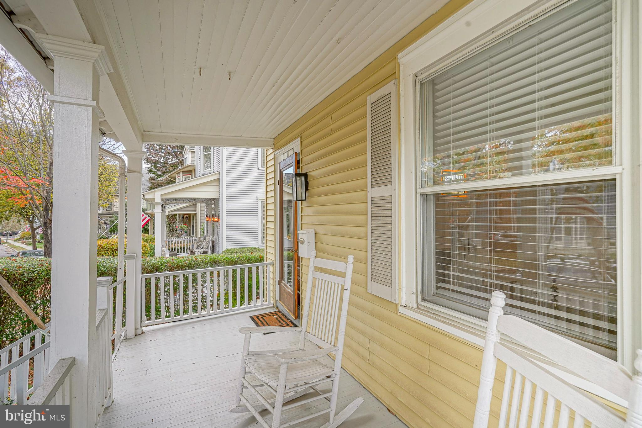 107 Colonial Avenue Haddonfield, NJ 08033 - Photo 3 of 29 a view of a balcony with wooden chairs