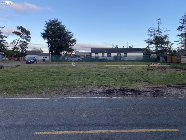 1204 37th Place Seaview, WA 98644 - Photo 13 of 19 a view of a big house with a big yard and large trees