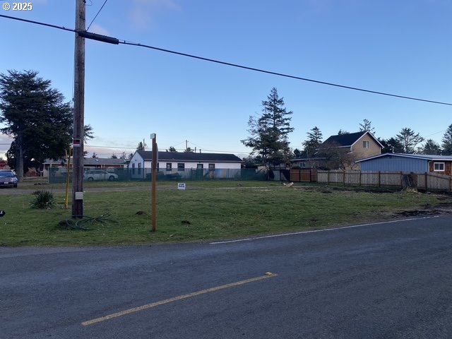 1204 37th Place Seaview, WA 98644 - Photo 14 of 19 a view of a house with a big yard and potted plants