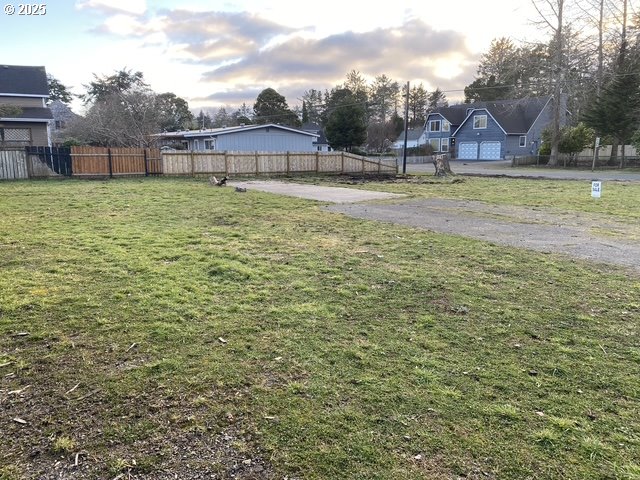 1204 37th Place Seaview, WA 98644 - Photo 3 of 19 a view of a yard with a house
