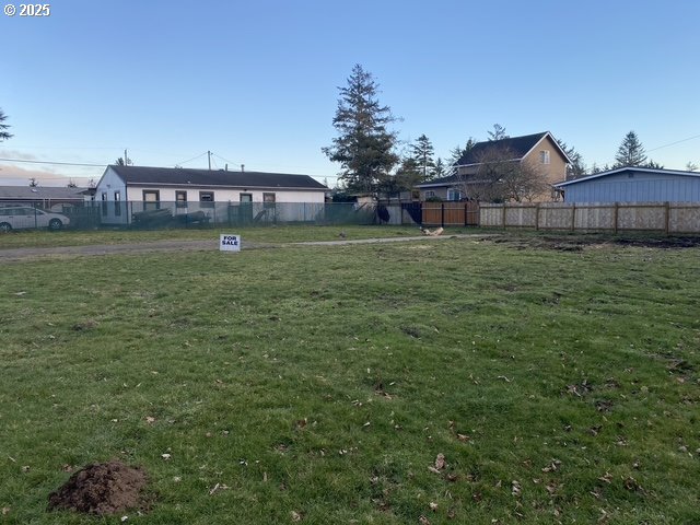1204 37th Place Seaview, WA 98644 - Photo 9 of 19 a backyard of a house with lots of green space