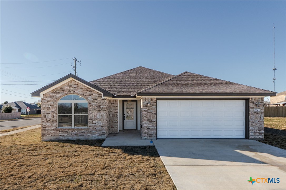 2005 Blackhawk Loop Belton, TX 76513 - Photo 1 of 37 a front view of a house with a yard