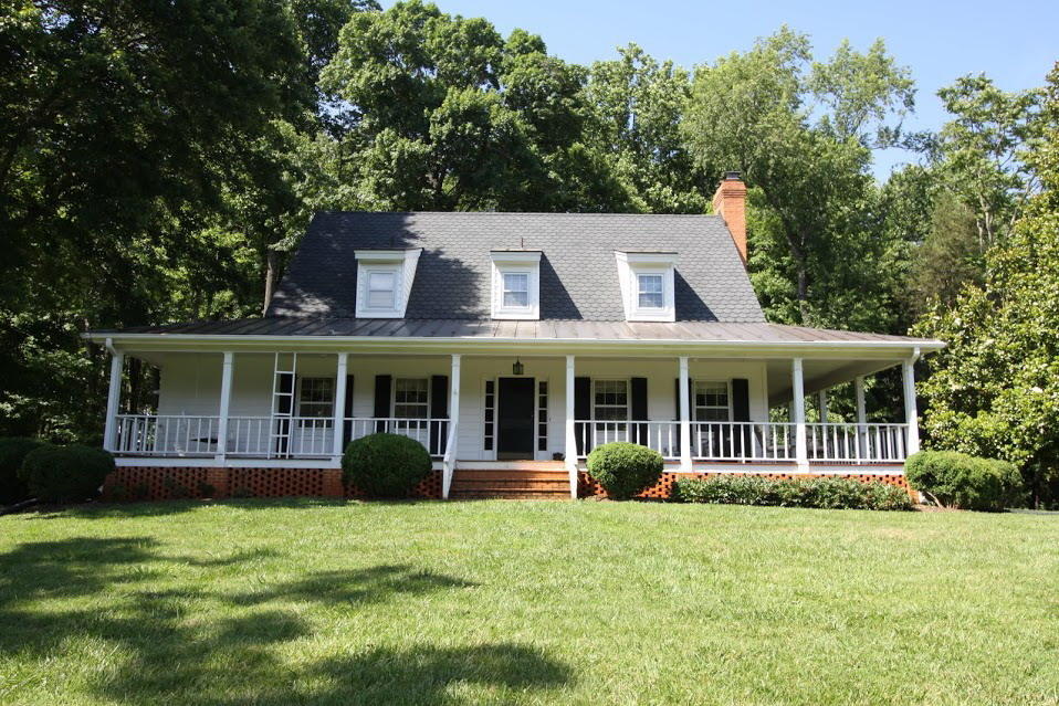 a view of a house with a garden