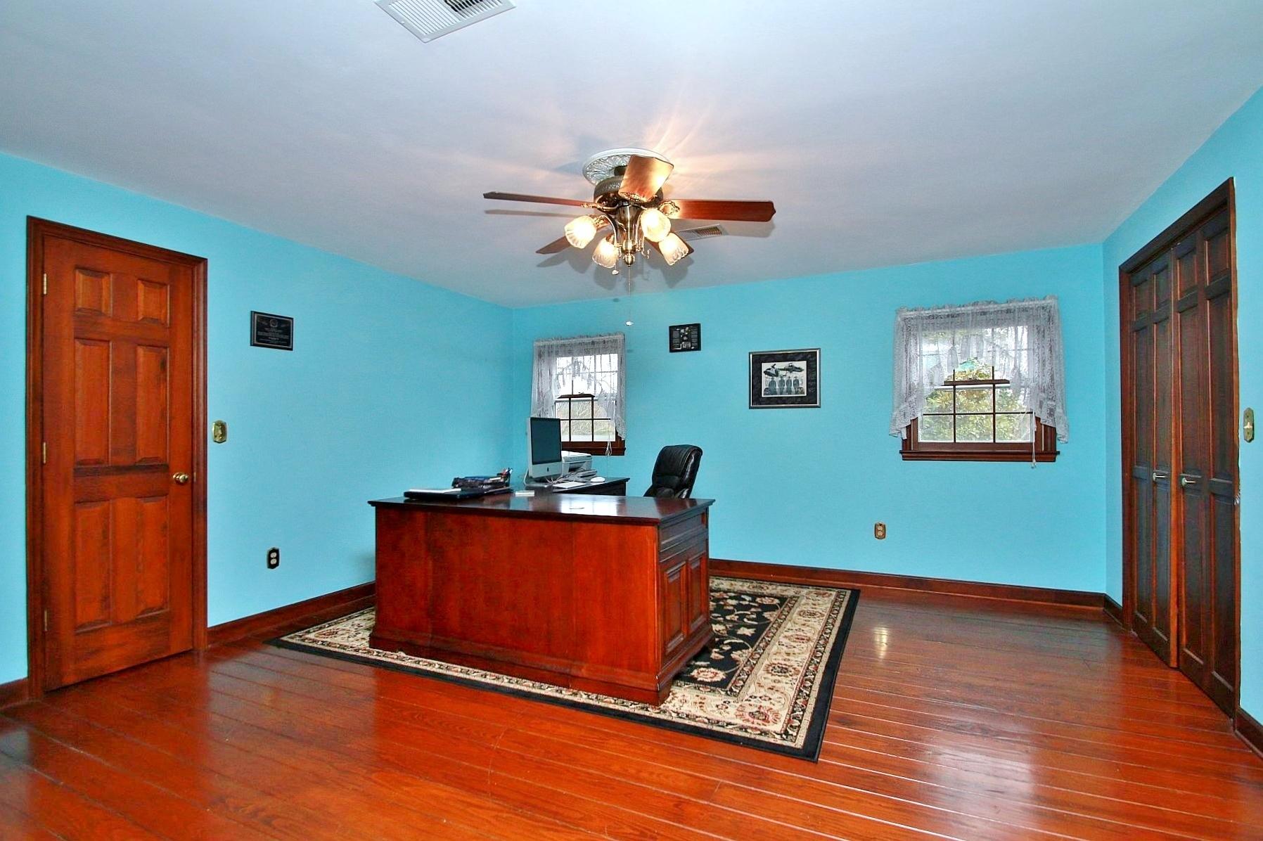392 Morgans Fork Road Penhook, VA 24137 - Photo 21 of 56 a room with furniture and wooden floor