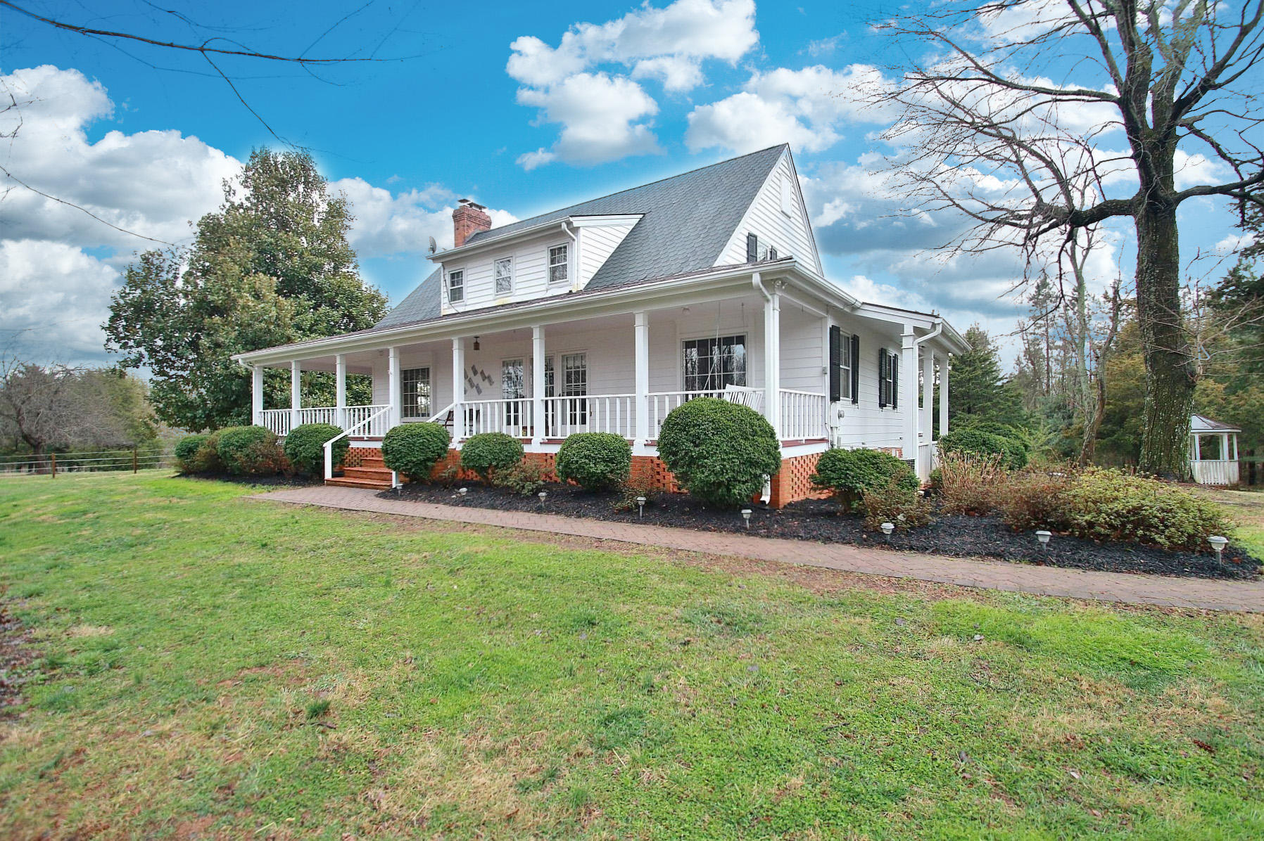 392 Morgans Fork Road Penhook, VA 24137 - Photo 32 of 56 a front view of house with yard and green space