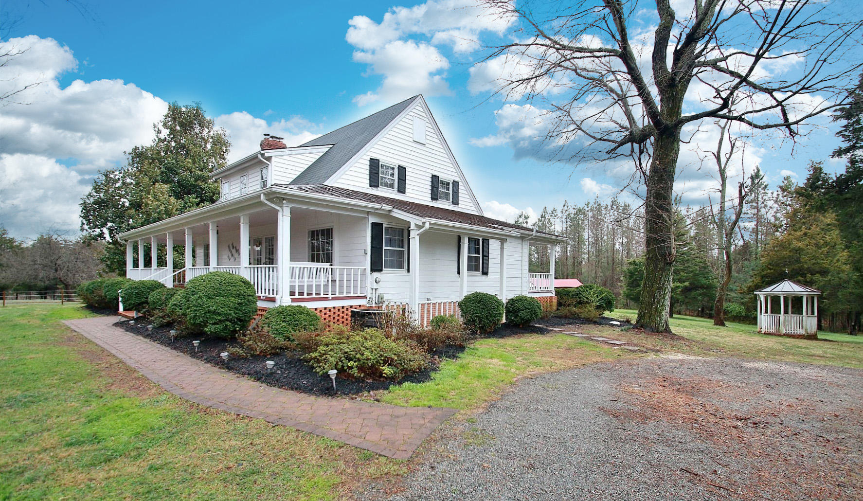 392 Morgans Fork Road Penhook, VA 24137 - Photo 33 of 56 a front view of a house with garden