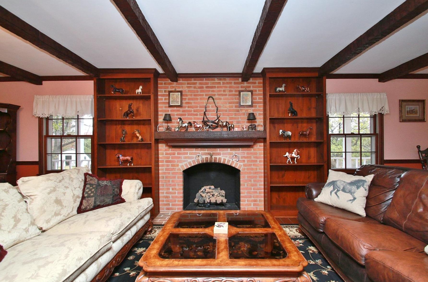 392 Morgans Fork Road Penhook, VA 24137 - Photo 5 of 56 a living room with furniture and a fireplace