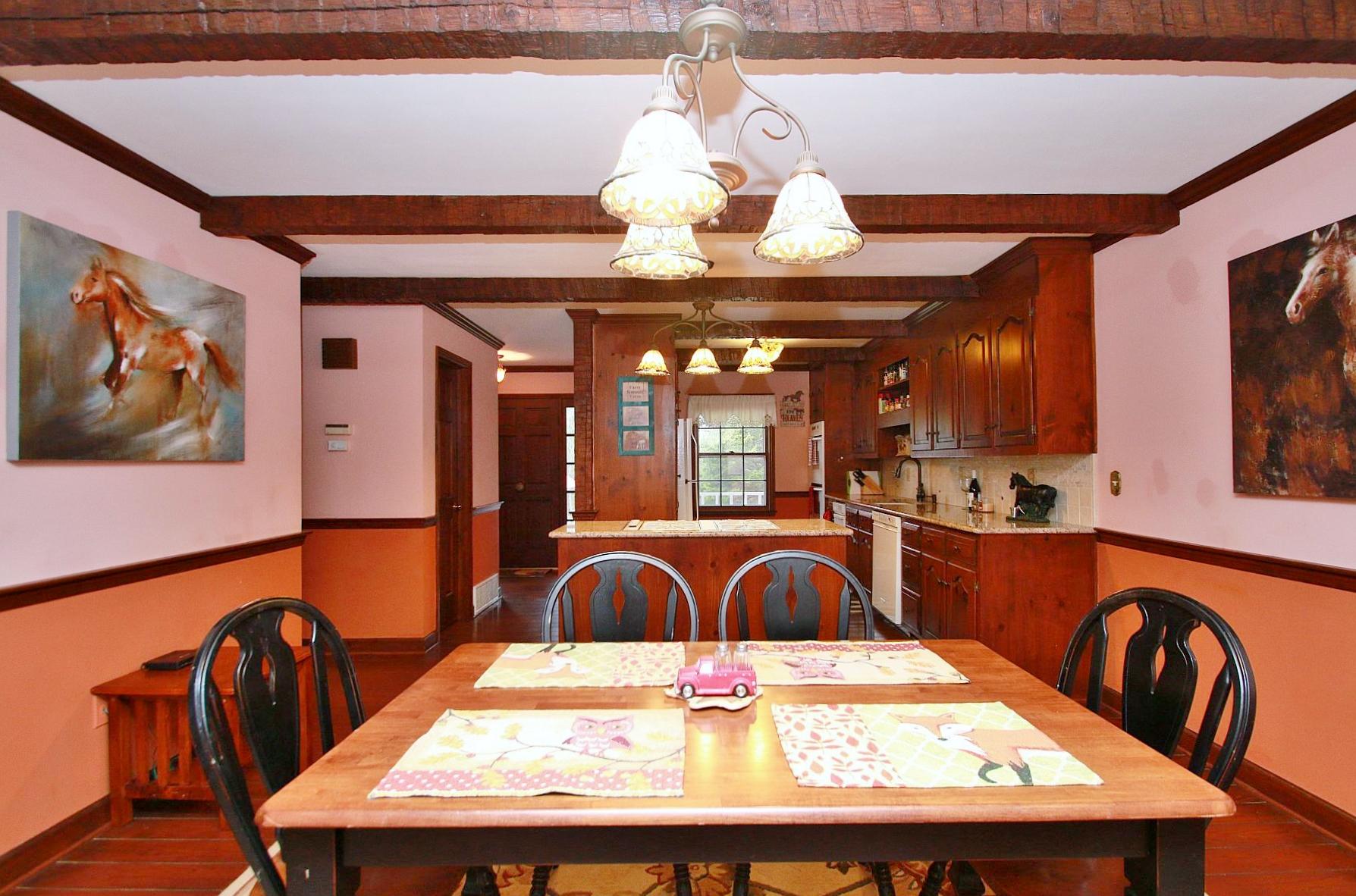 392 Morgans Fork Road Penhook, VA 24137 - Photo 41 of 56 a view of a dining room with furniture and chandelier
