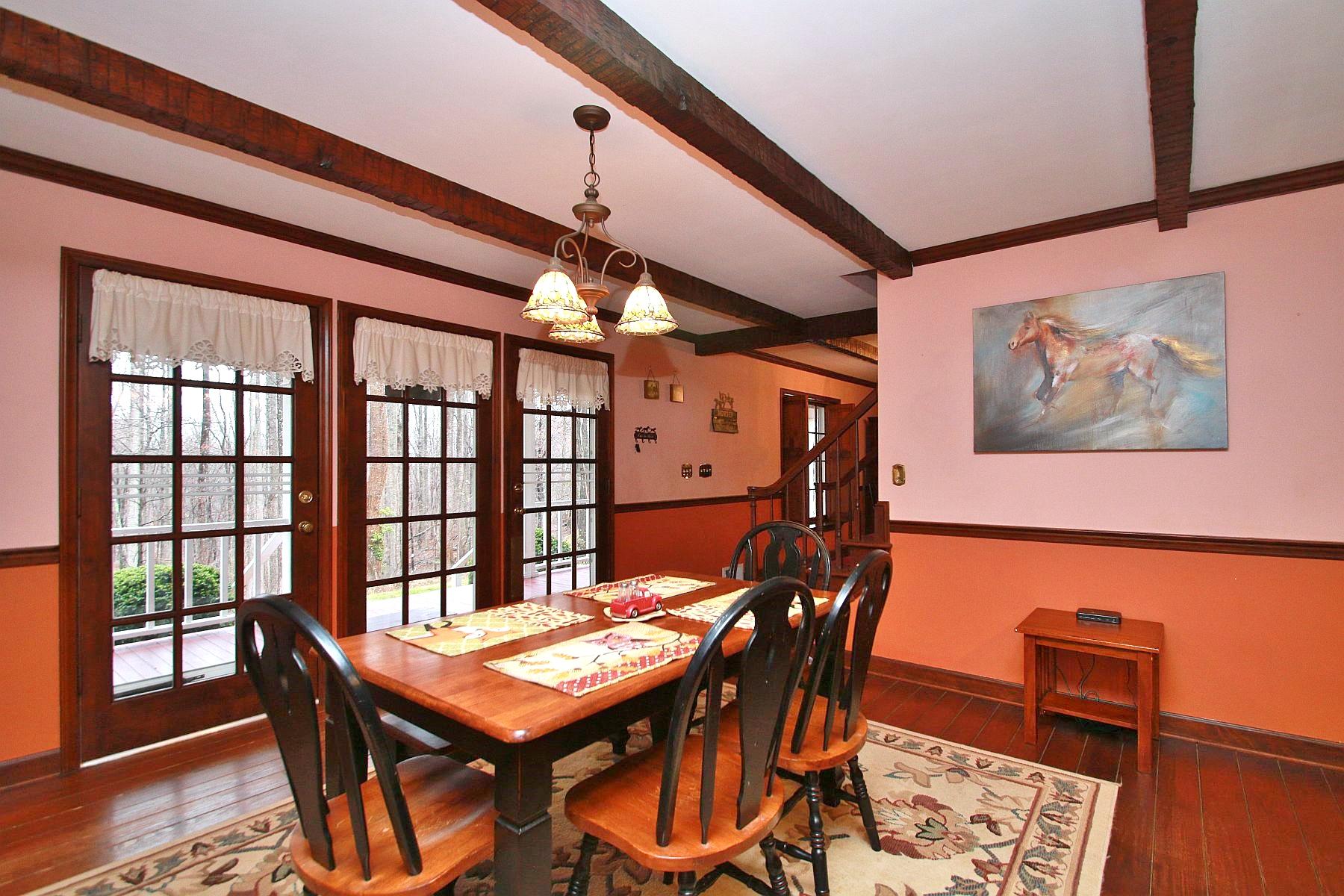 392 Morgans Fork Road Penhook, VA 24137 - Photo 44 of 56 a view of a dining room with furniture window and wooden floor