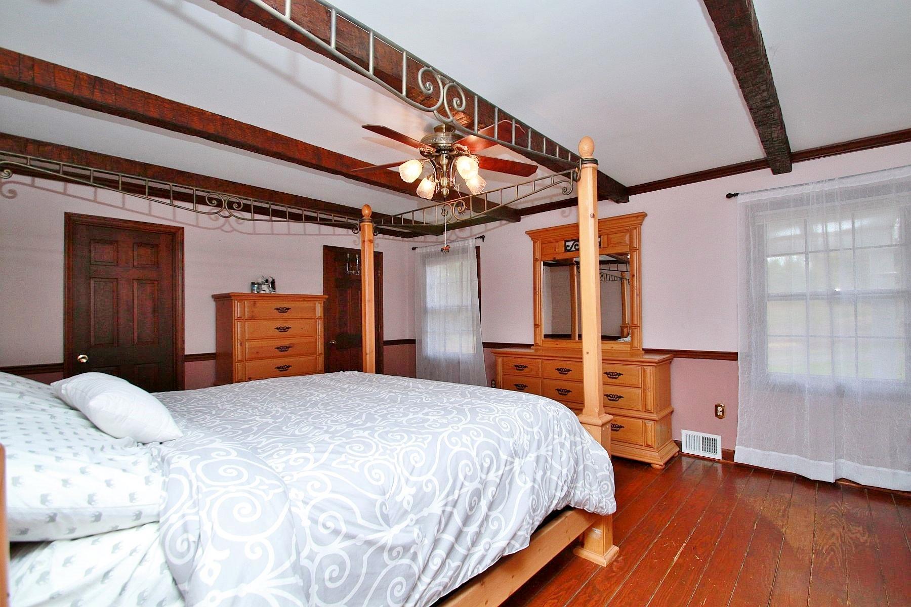 392 Morgans Fork Road Penhook, VA 24137 - Photo 46 of 56 a bedroom with a bed and a closet