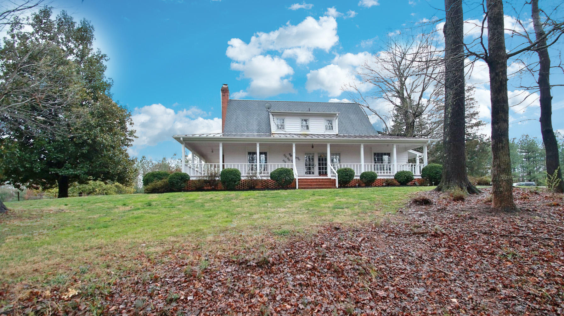 392 Morgans Fork Road Penhook, VA 24137 - Photo 53 of 56 a front view of a house with a yard