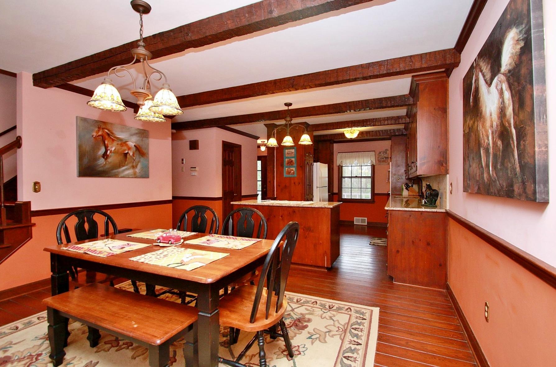 392 Morgans Fork Road Penhook, VA 24137 - Photo 10 of 56 a dining room with furniture and wooden floor