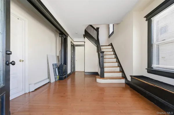 a view of an entryway with staircase