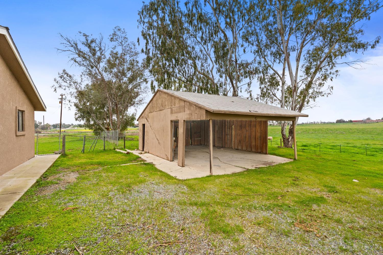 10580 Old Stage Road Porterville, CA 93257 - Photo 43 of 73 a view of a house with backyard and tree