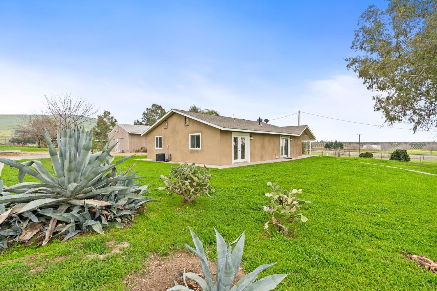 10580 Old Stage Road Porterville, CA 93257 - Photo 6 of 73 a view of an house with backyard space and garden