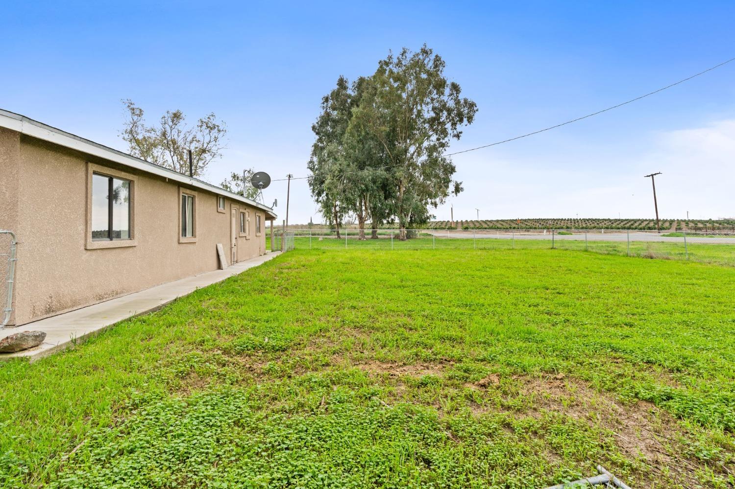 10580 Old Stage Road Porterville, CA 93257 - Photo 61 of 73 a backyard of a house with lots of green space