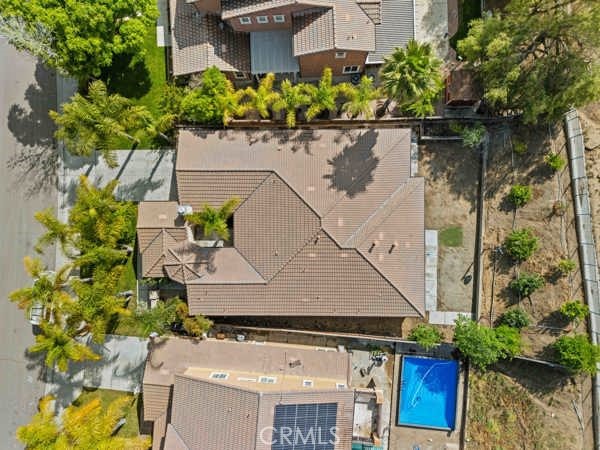 341 Caldera Street Perris, CA 92570 - Photo 1 of 53 an aerial view of a house with a yard and a garden